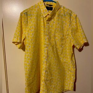 1901 short sleeve button down sort with lemon print on it